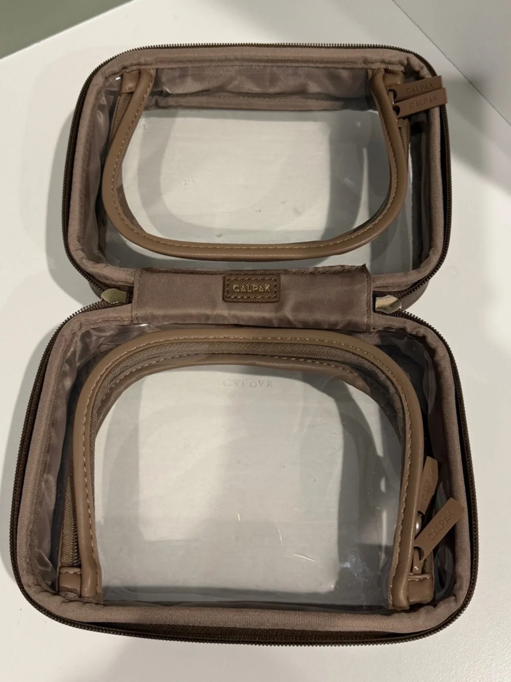 CALPAK small clear cosmetics case in Mocha